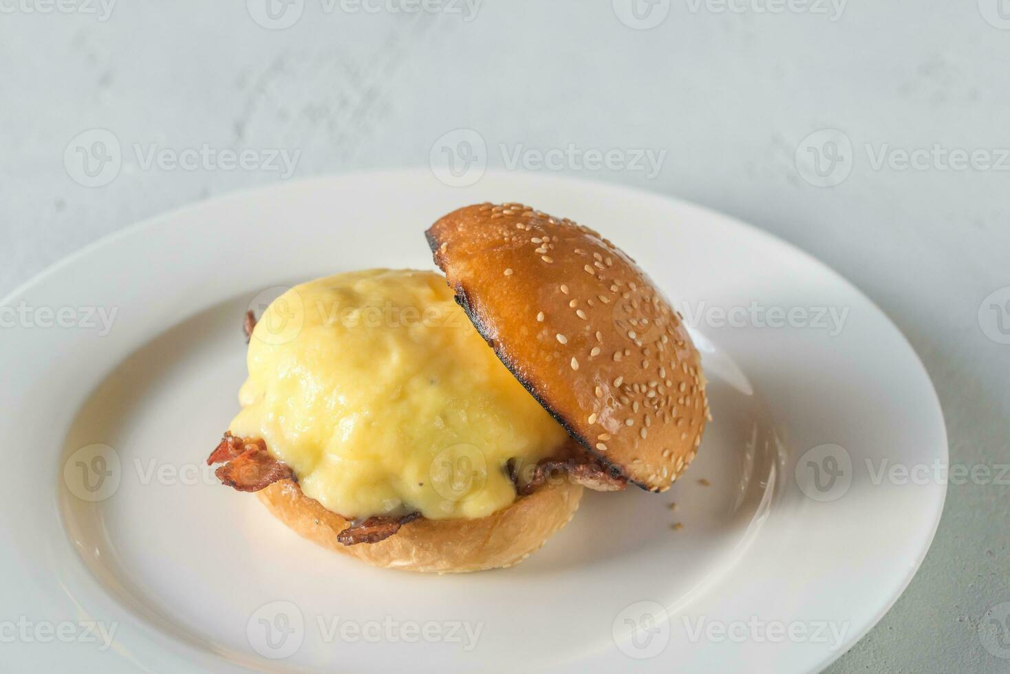 Eggs Benedict on the white plate photo