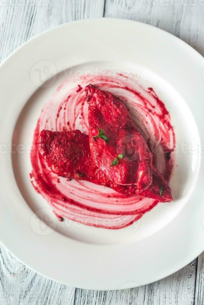 Scaloppini - chicken with beetroot sauce photo