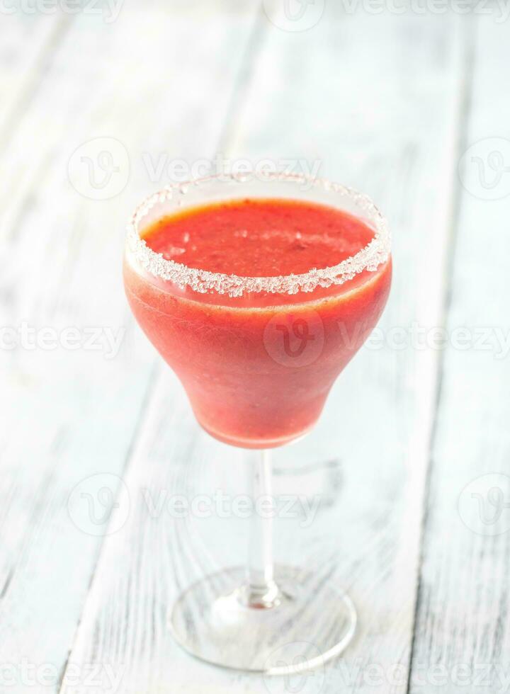 Glass of strawberry margarita cocktail photo