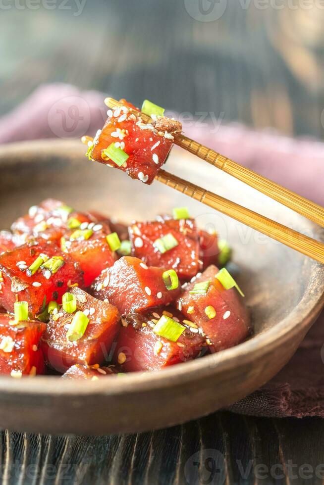 Bowl of poke - traditional Hawaiian dish photo