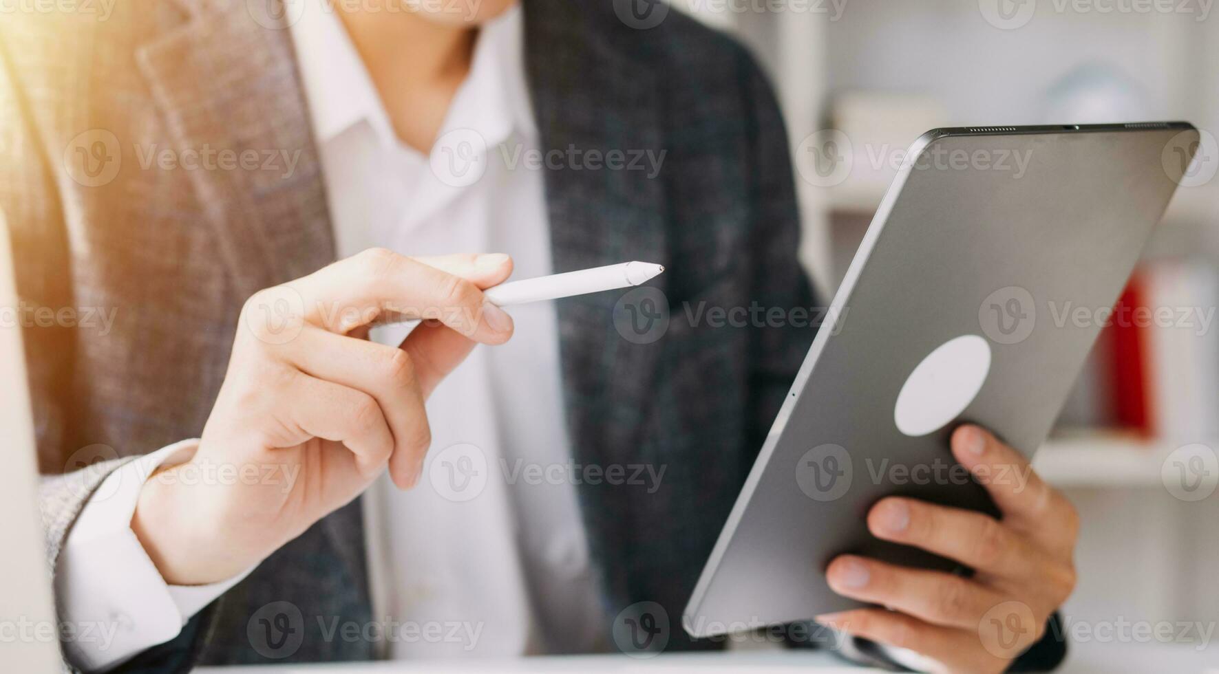 Businessman working on a laptop computer to document management online documentation database digital file storage system software records keeping database technology file access doc sharing. photo