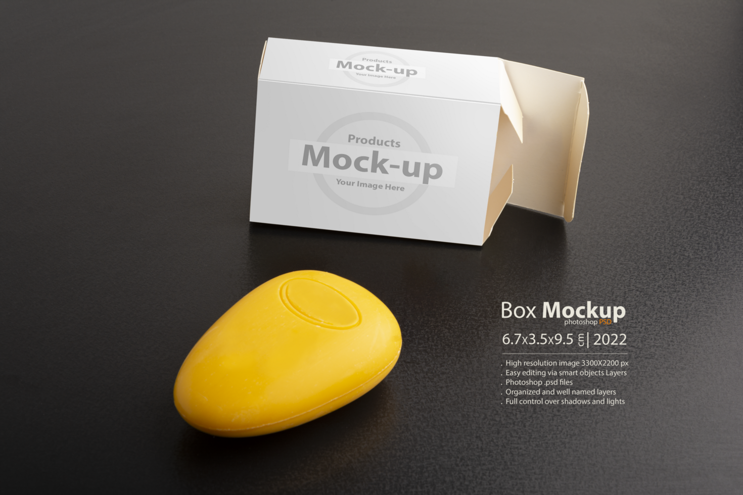 Opened yellow soap package on black surface psd