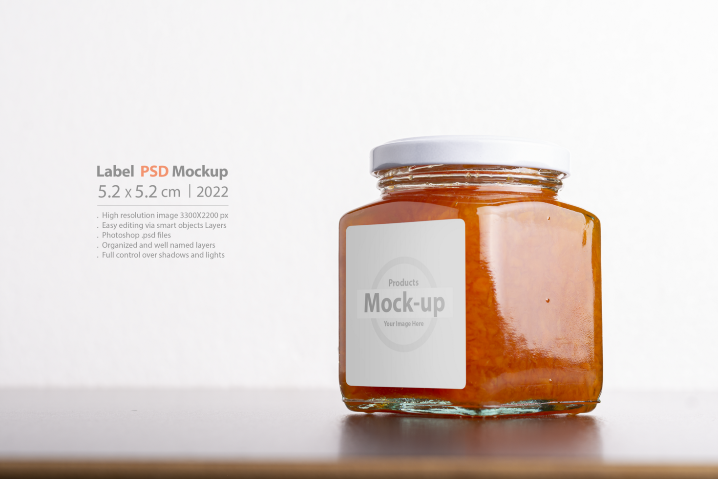 Juicy homemade carrot jam in glass jar on a table background psd