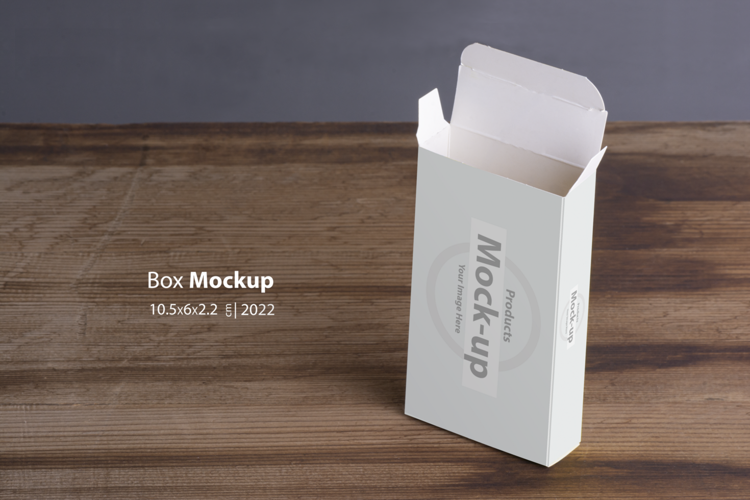 Vertical opened empty pillbox on wooden table background psd
