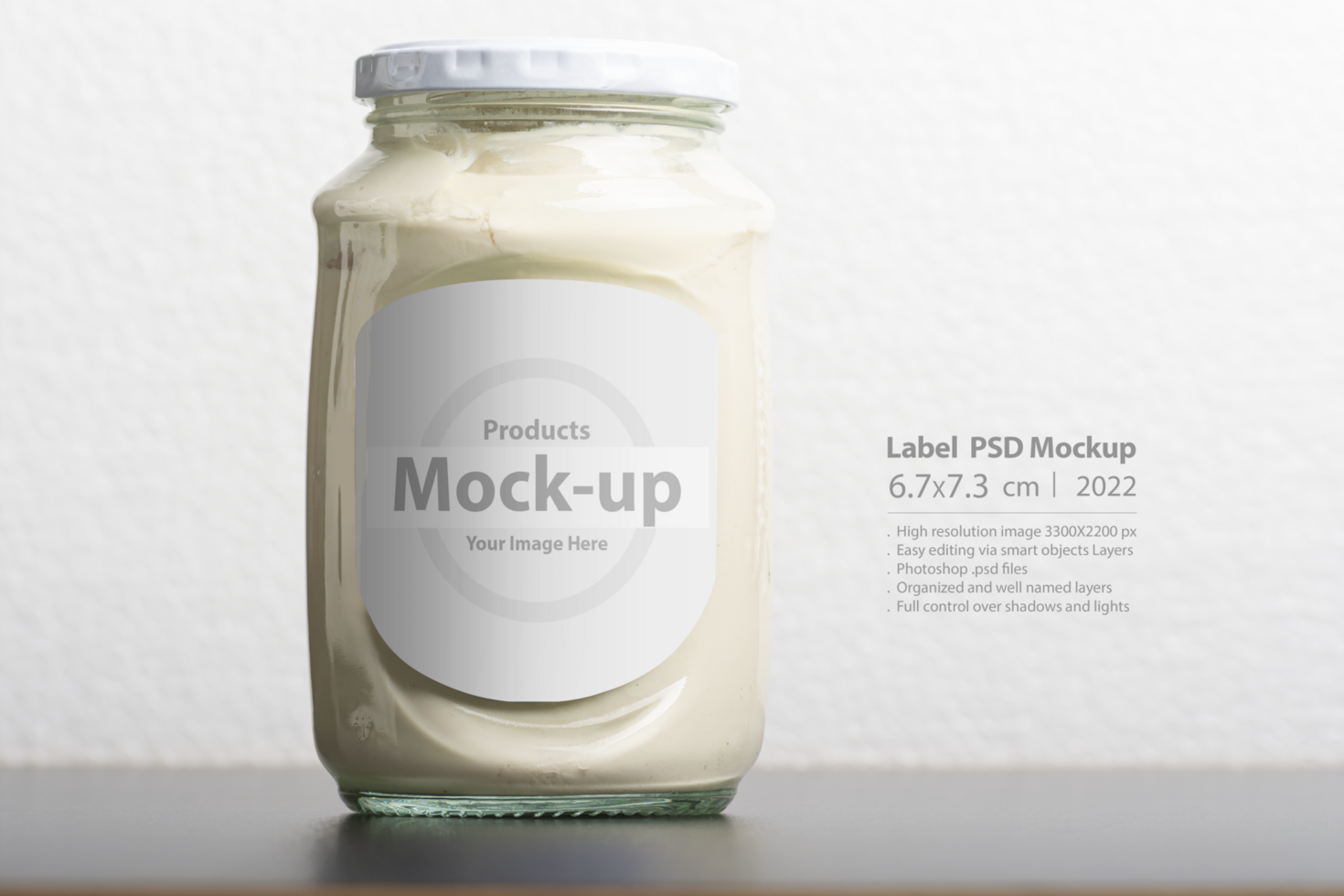 Whey glassy jar with round cap on black table psd
