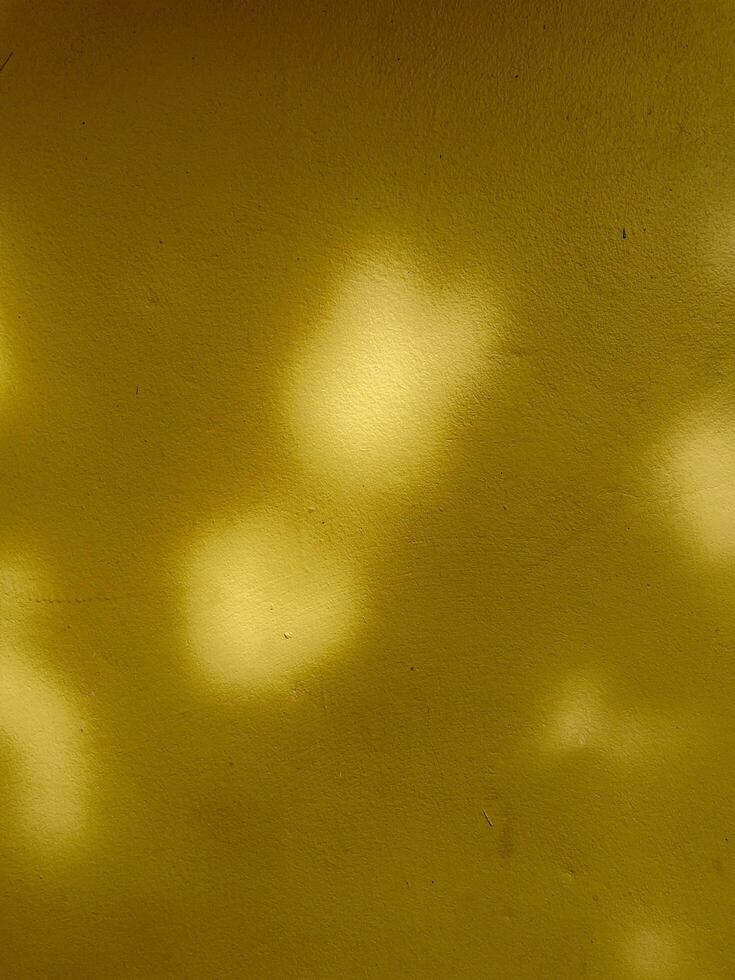 yellow wall background with sunrise photo