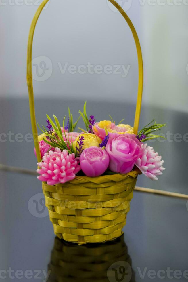 A bouquet of flowers that are made of soap. Soap bouquet, flower arrangement. For interior decoration or as a gift. photo