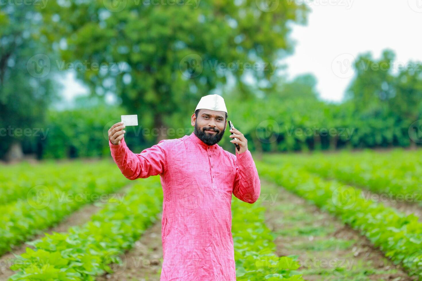 Indian farmer Holding gullak in hand, saving concept, happy poor farmer photo