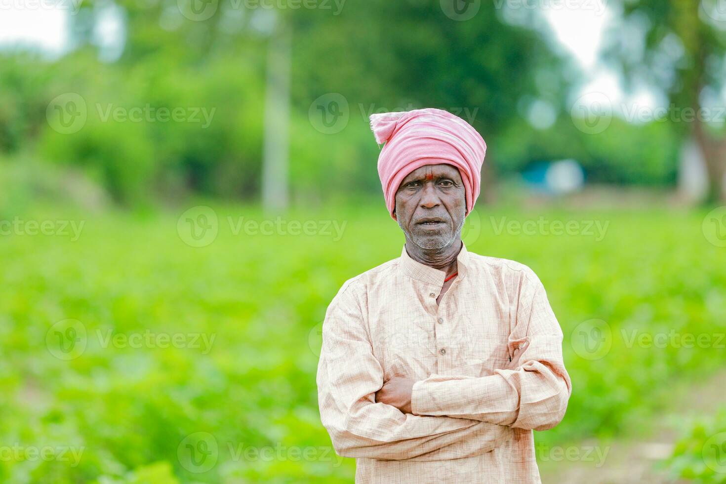 Indian farmer Holding gullak in hand, saving concept, happy poor farmer photo