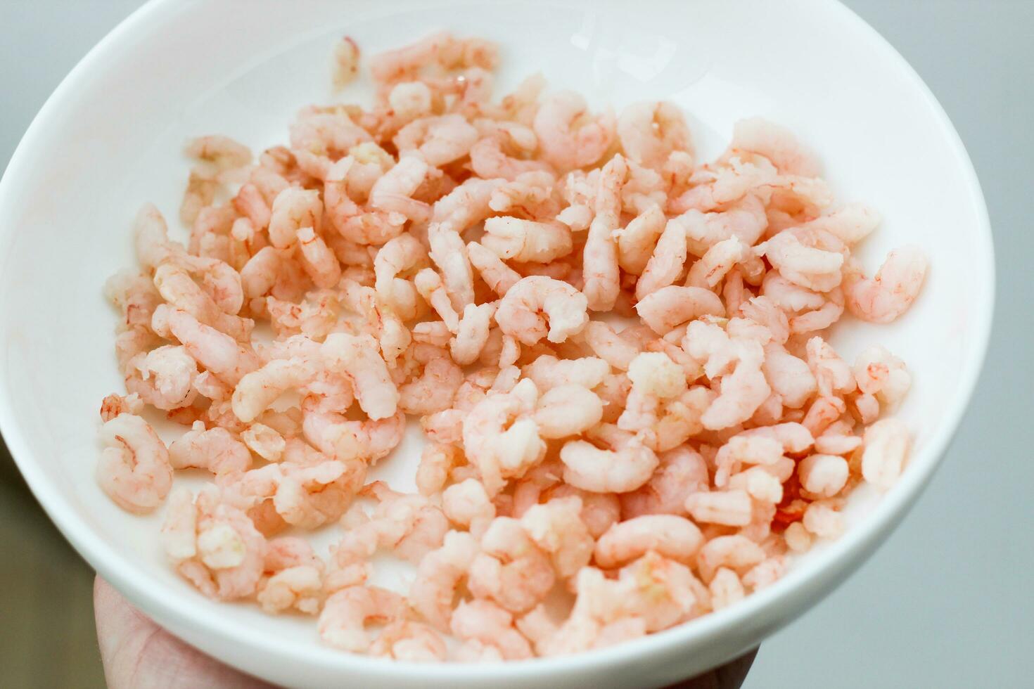 Close-up of peeled and shelled boiled shrimp photo