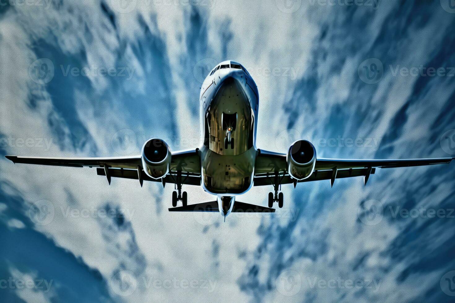 a large commercial airplane flying high in a cloudy sky photo