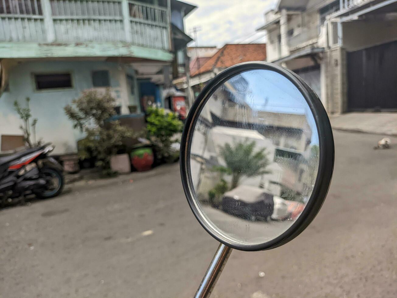 A close up of motorcycle rear view mirror photo