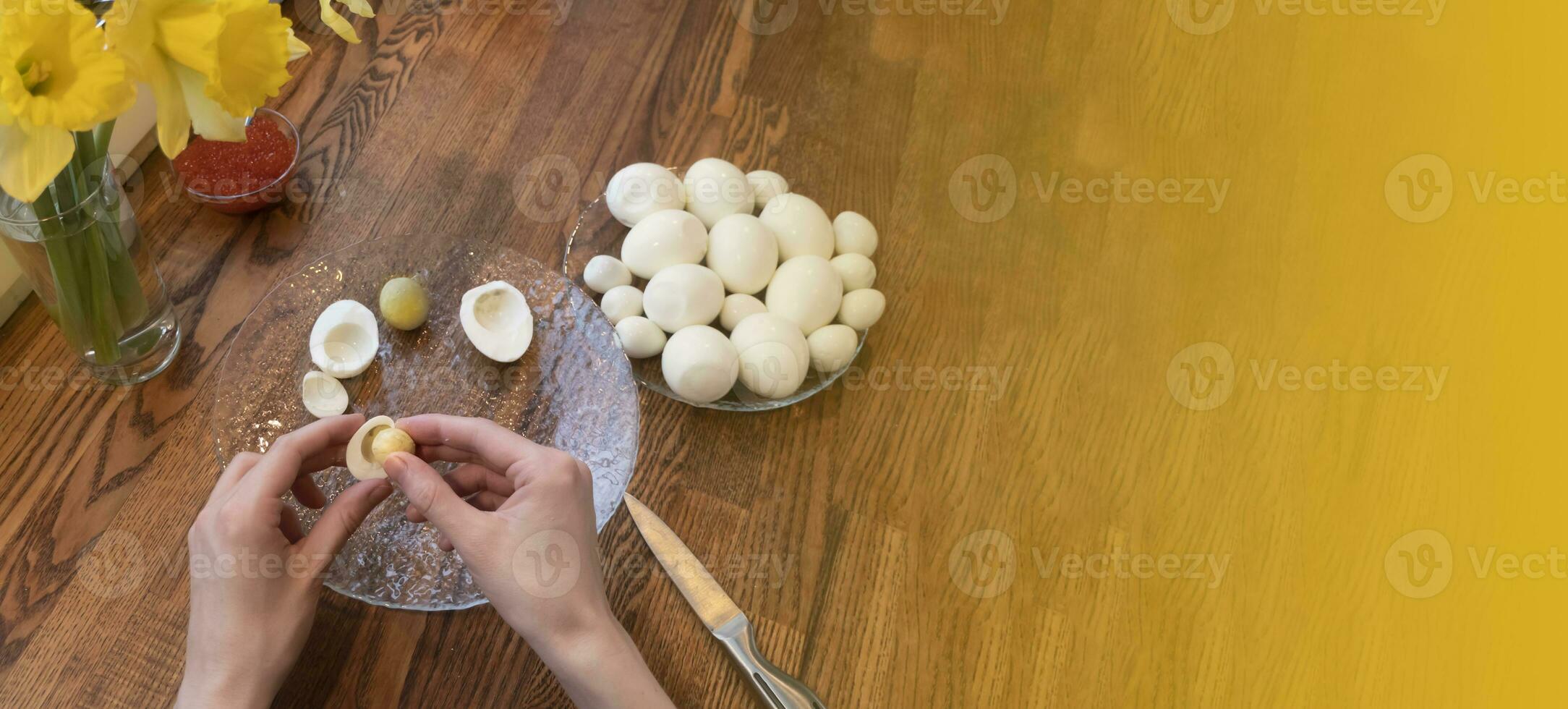 Step by step. egg cut in half, for making stuffed eggs photo