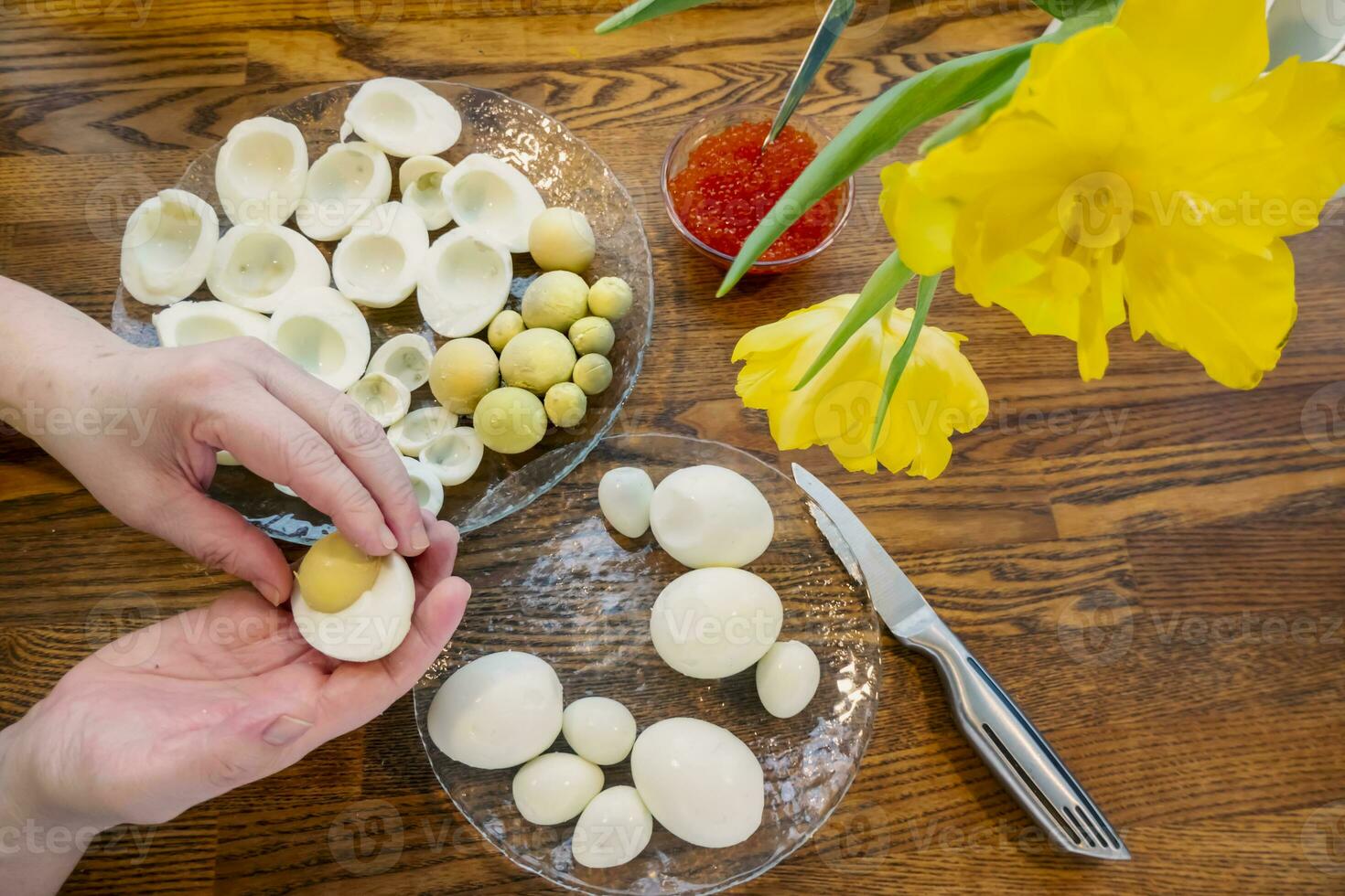 Step by step. egg cut in half, for making stuffed eggs photo