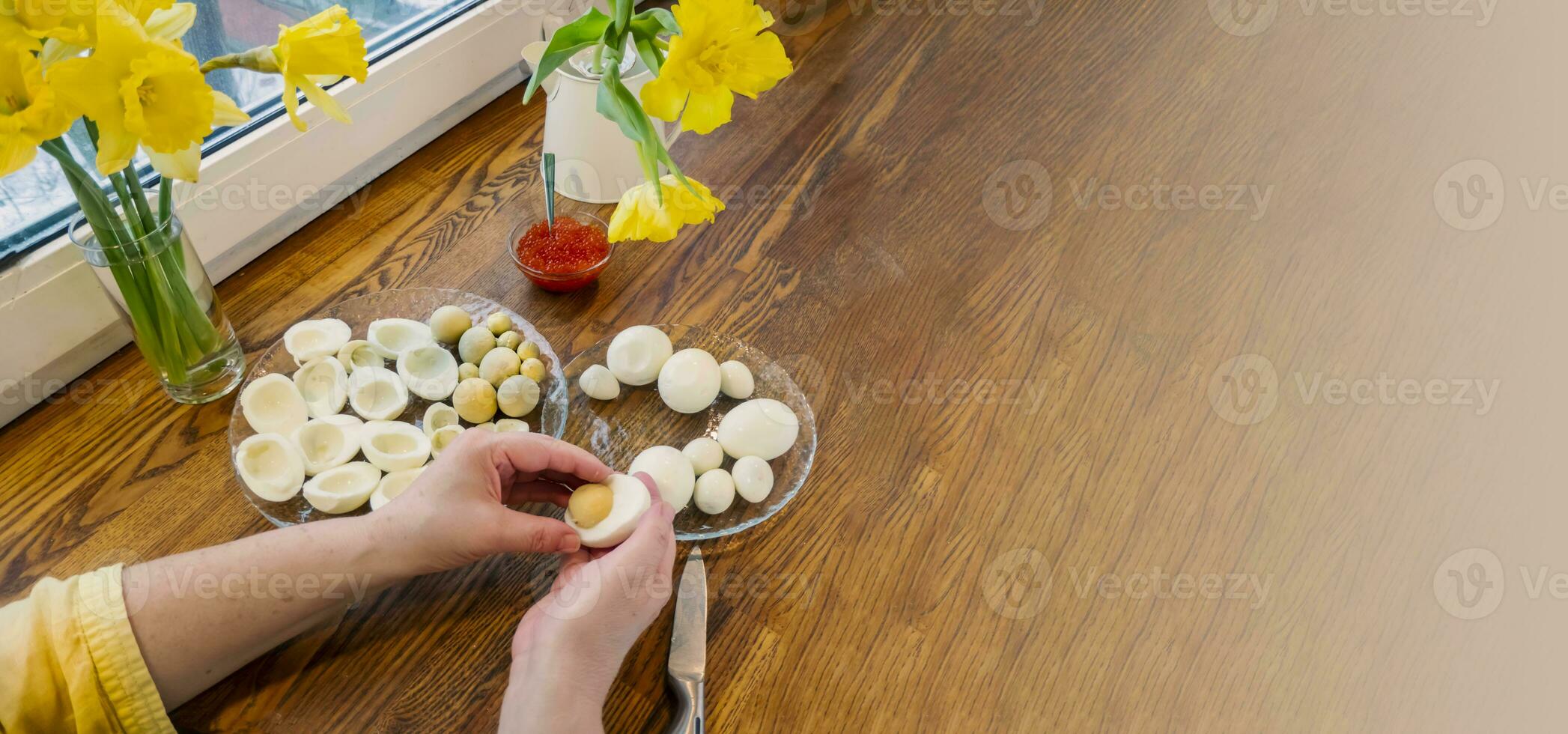 Step by step. egg cut in half, for making stuffed eggs photo