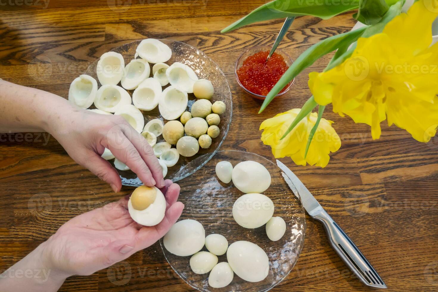 Step by step. egg cut in half, for making stuffed eggs photo