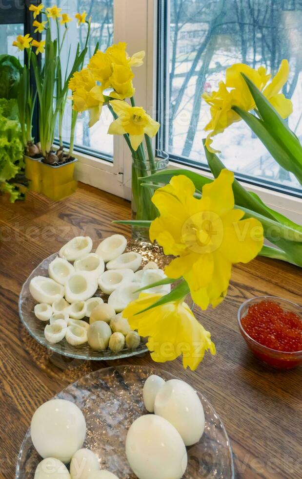 Step by step. egg cut in half, for making stuffed eggs photo