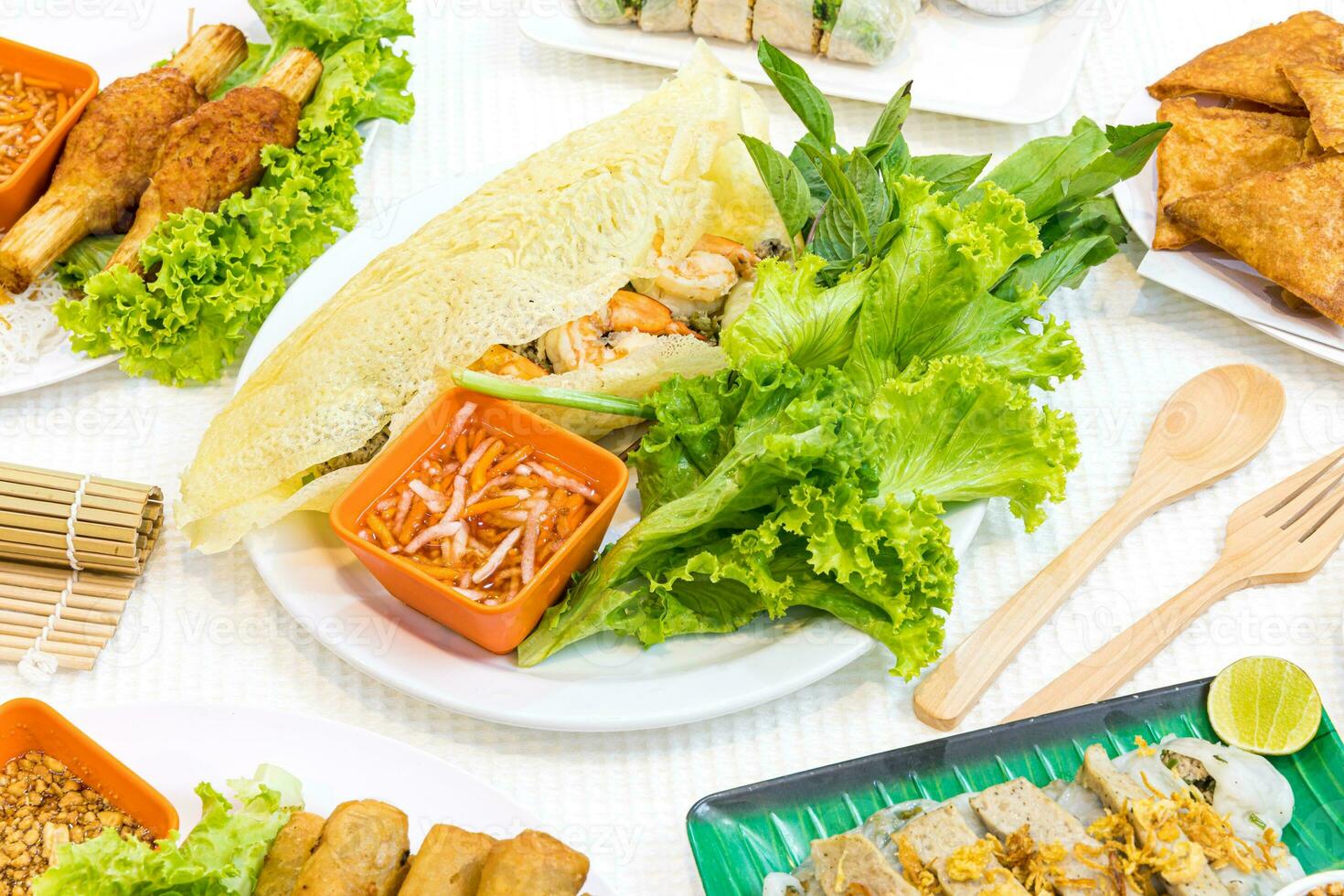 Vietnamese Savory Crepe - Vietnamese food. photo