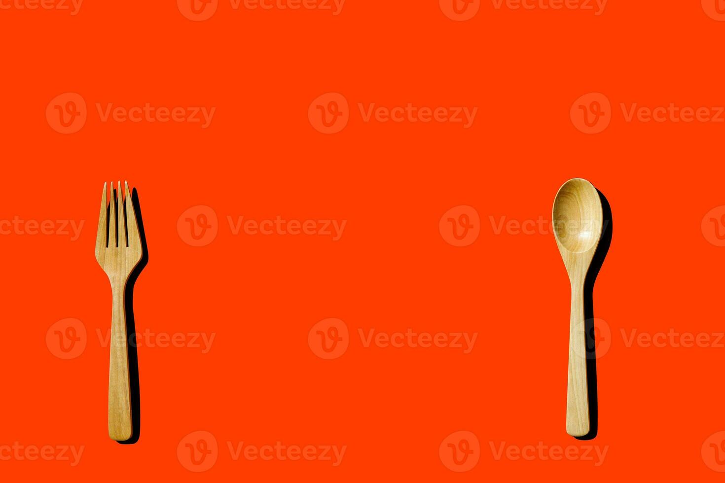 wooden spoon and fork, light and shadow Top view with space for your recipes. photo