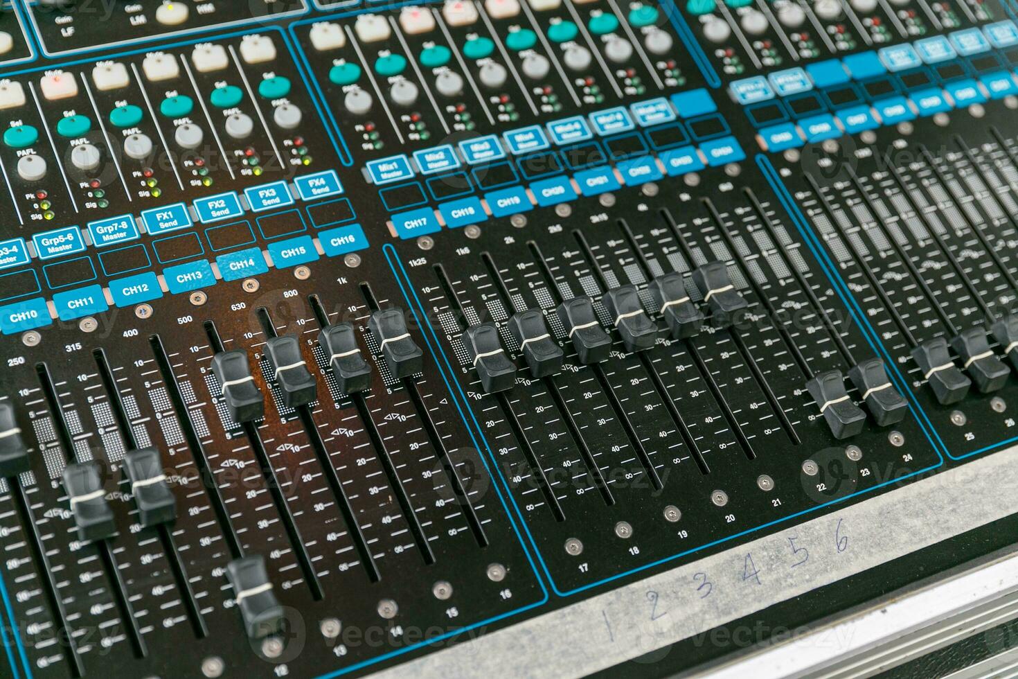 Sound audio mixer. General plan of sliders and buttons on a mixing console photo