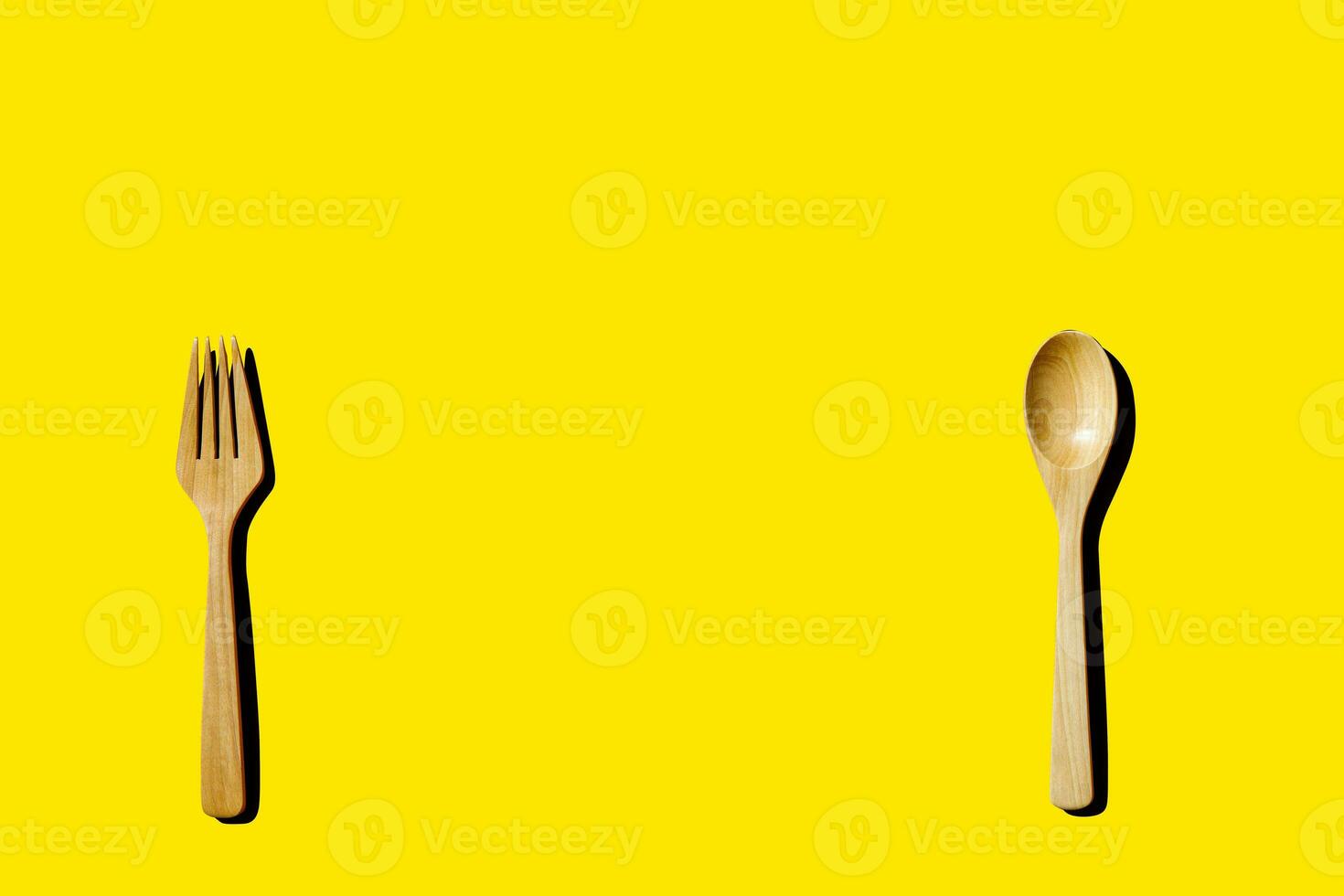 wooden spoon and fork, light and shadow Top view with space for your recipes. photo