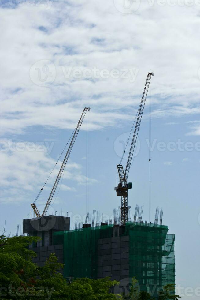 Construction in the city on tall buildings photo