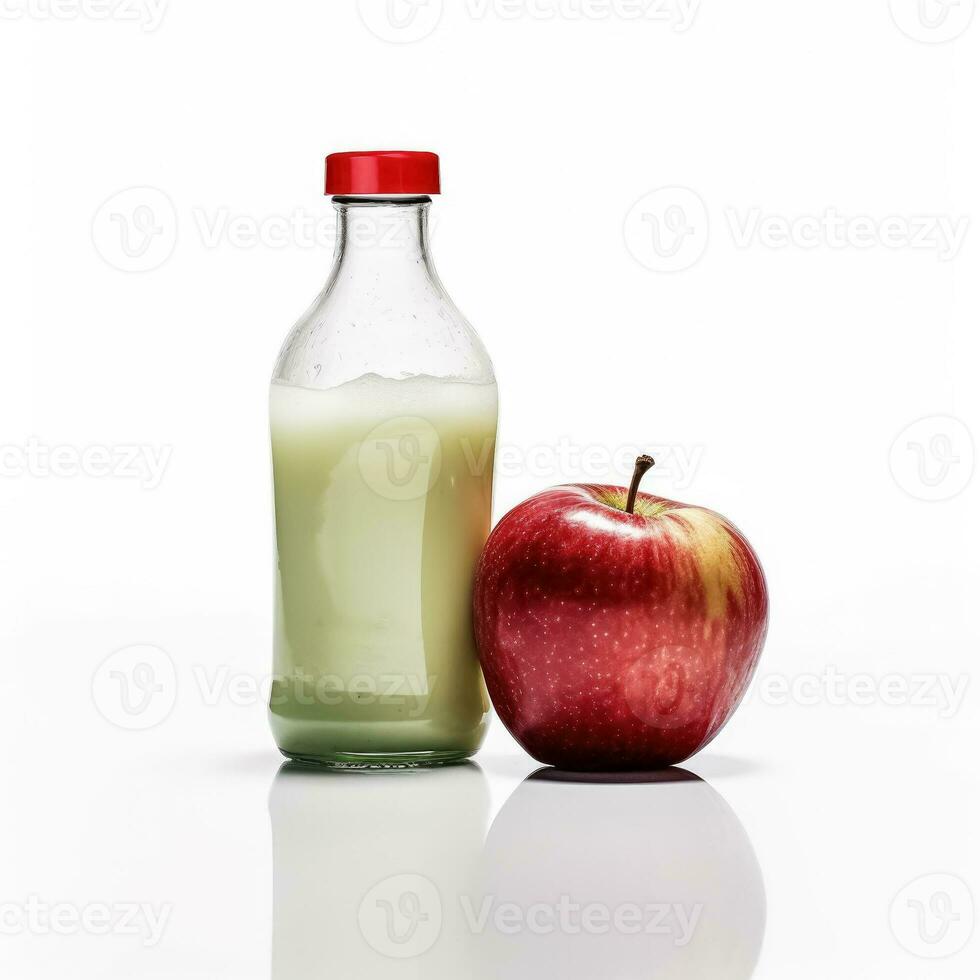 Apple Smoothie shake in a bottle isolated on white background photo