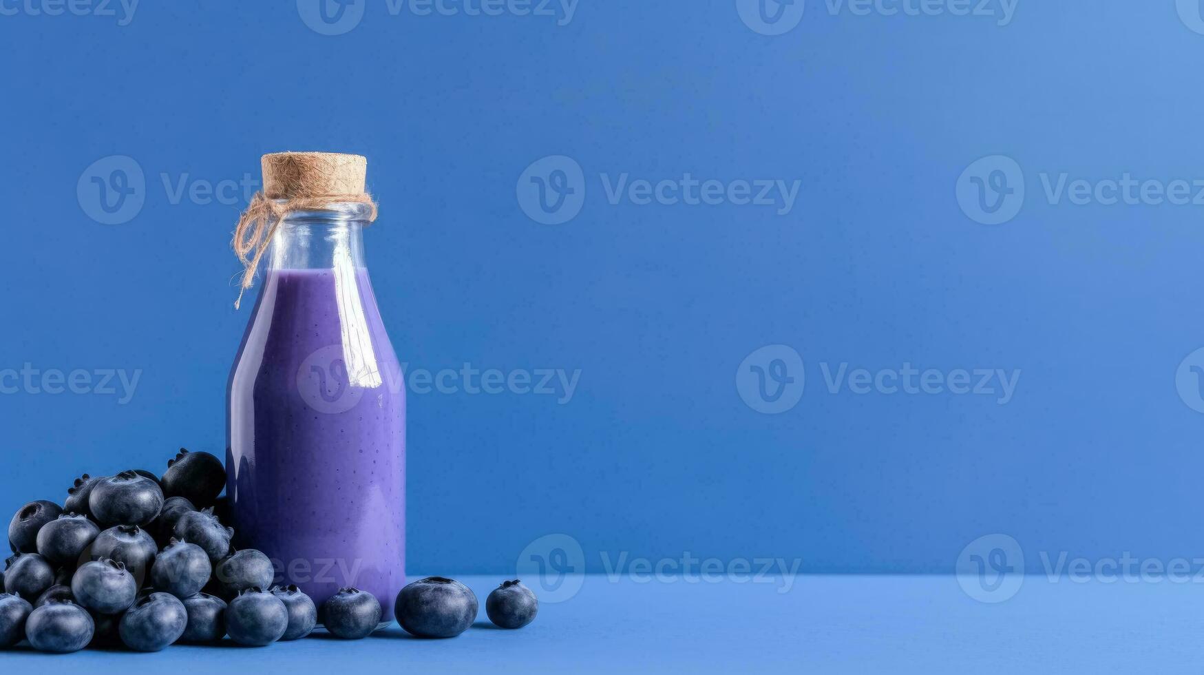 Blueberry smoothie isolated on background with a copy space photo