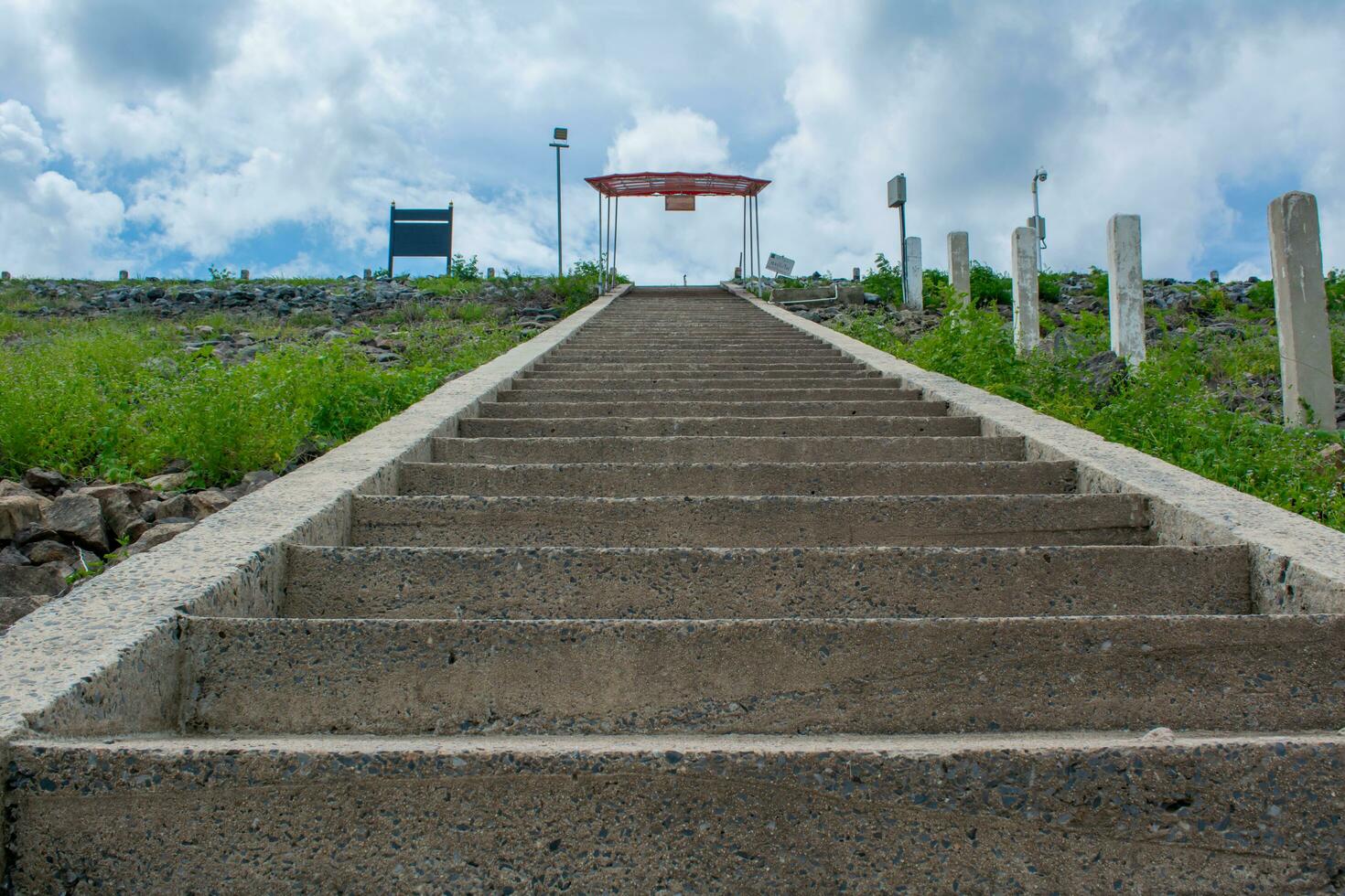 step up the hill and a long staircase photo
