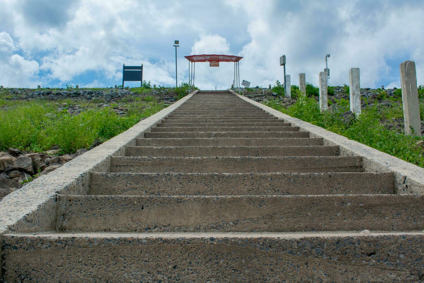 step up the hill and a long staircase photo