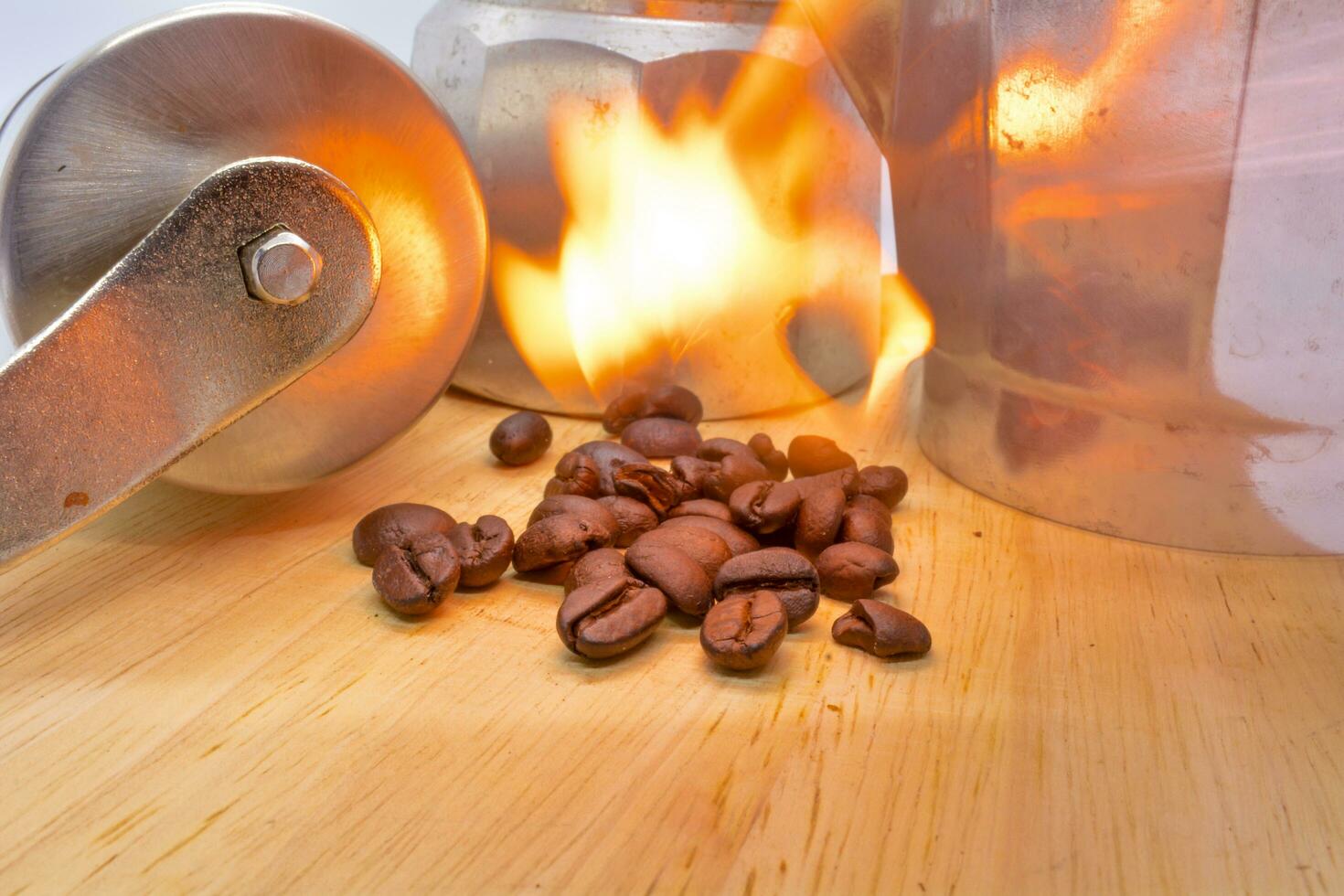 roasted coffee beans fire background photo