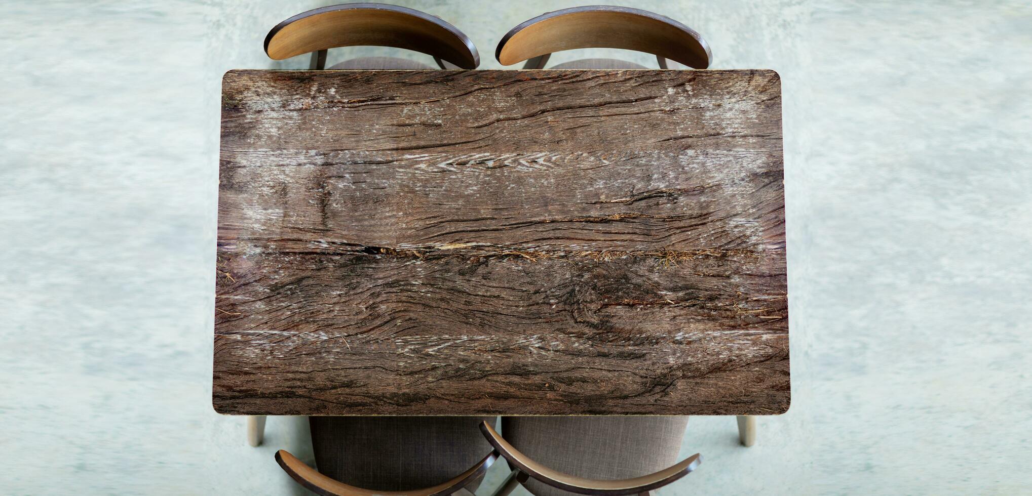 Wood table with chair on retro old floor top view photo