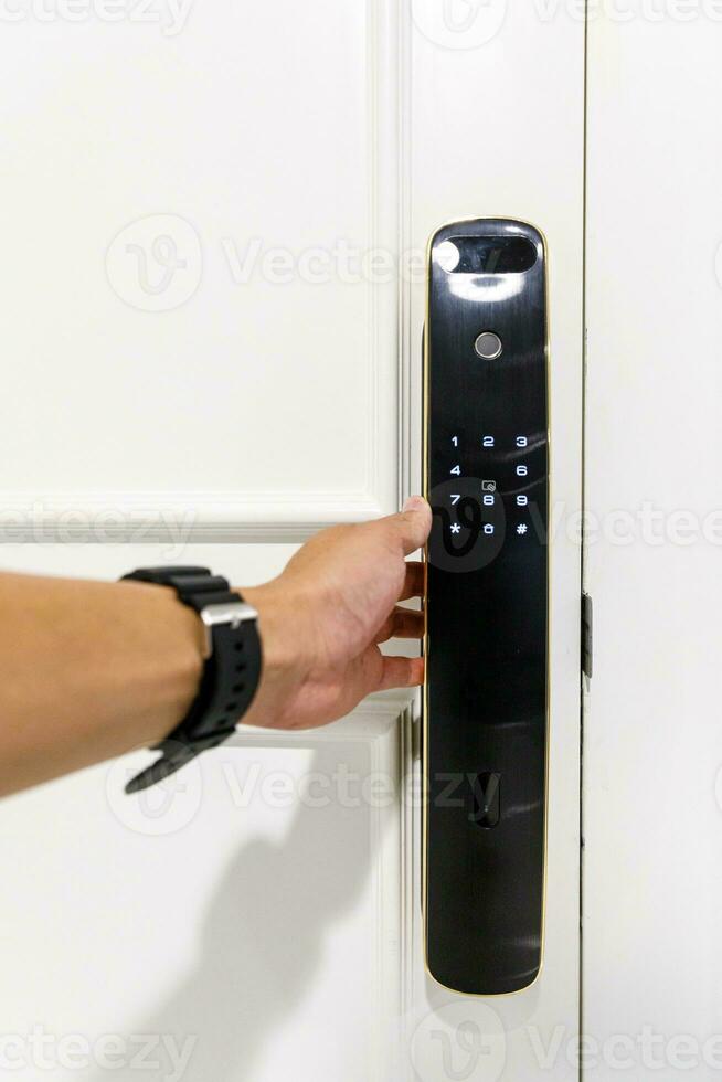 Hand open door digital and access control in a condo photo