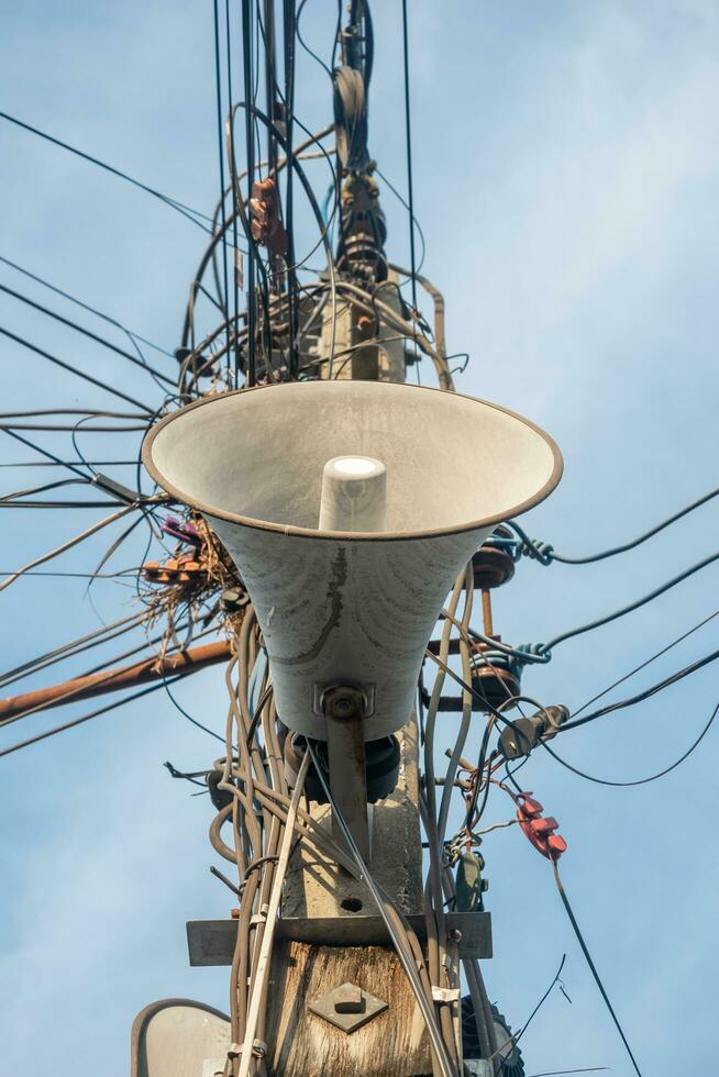 horn speaker on electric pole photo