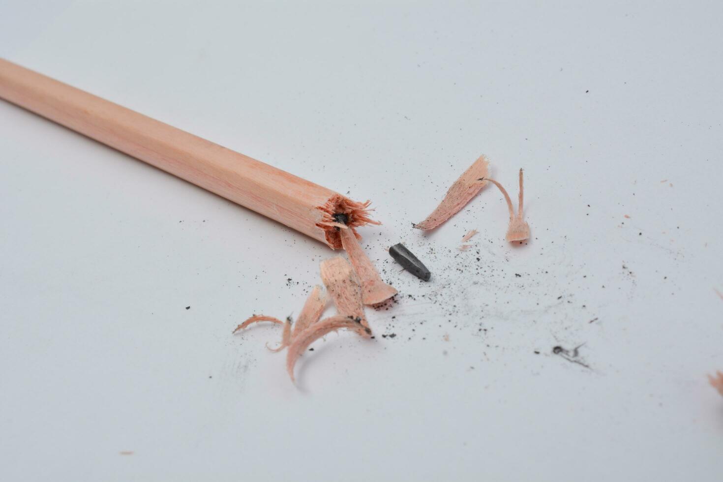 Broken pencil, close up of used pencil on white background with clipping path photo