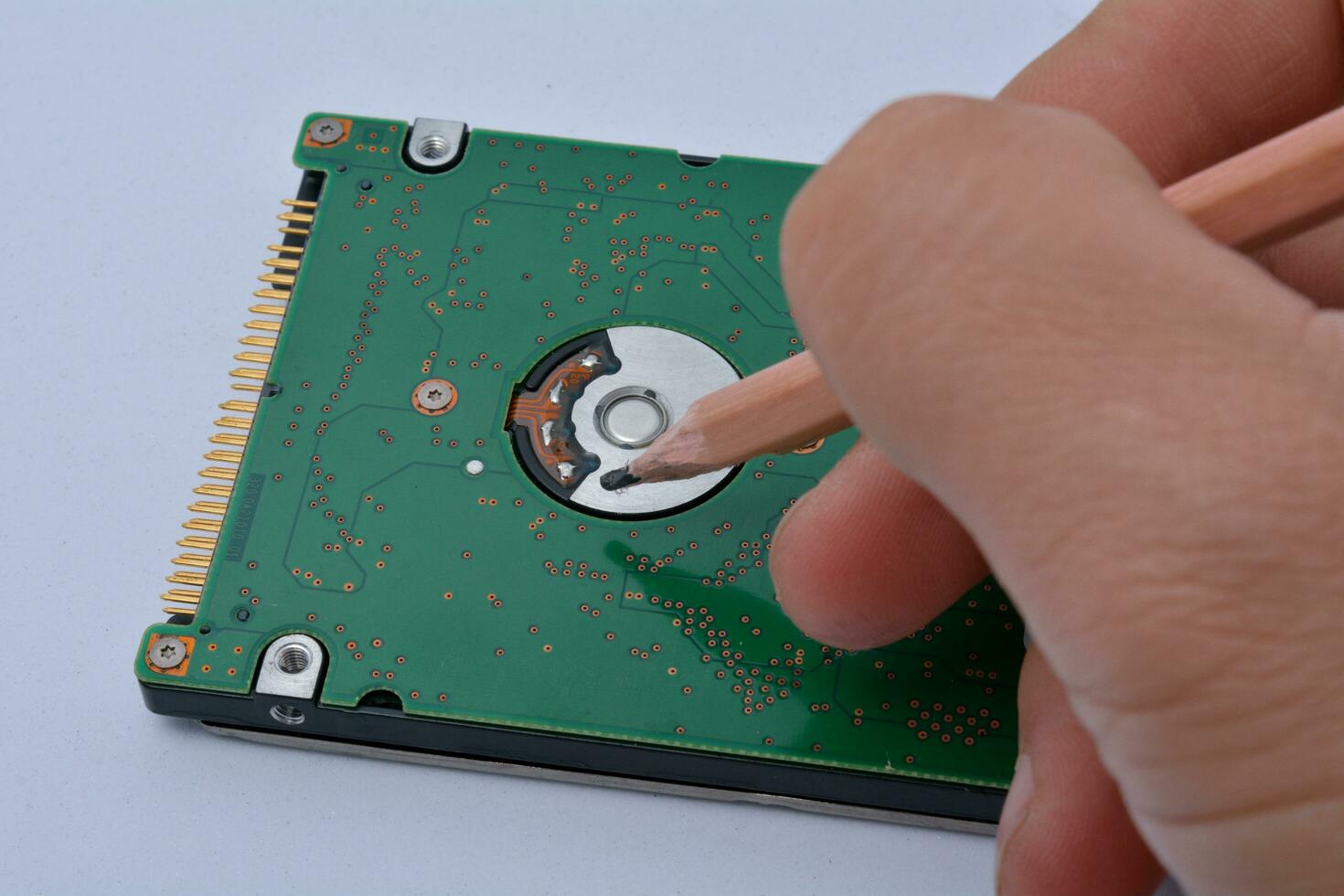 Save data on old hard drives, with a hand-drawn pencil. photo