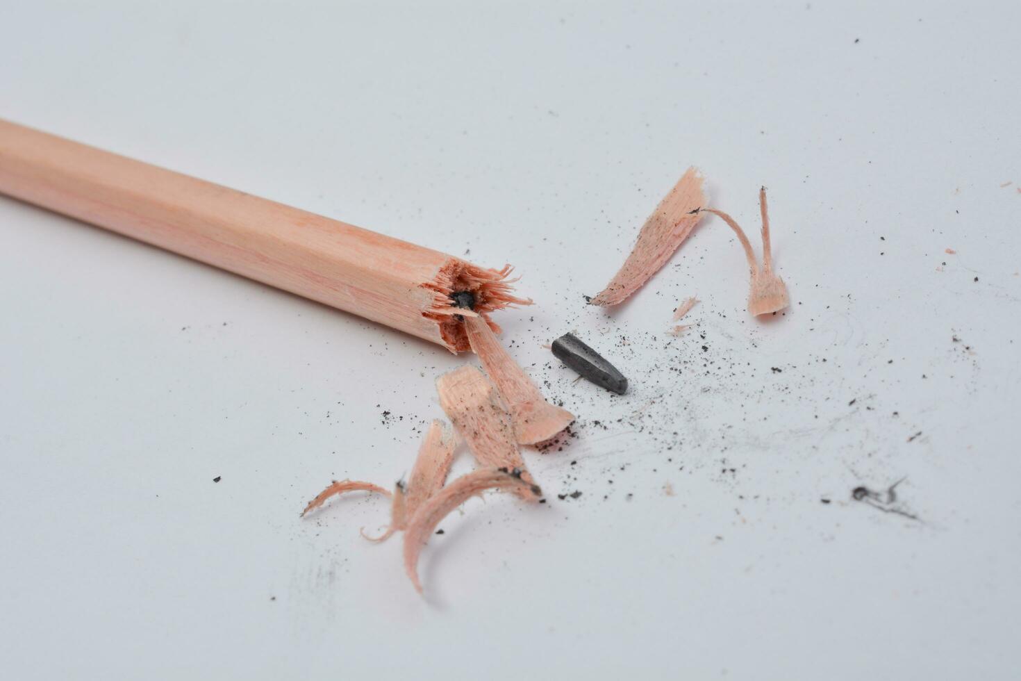 Broken pencil, close up of used pencil on white background with clipping path photo