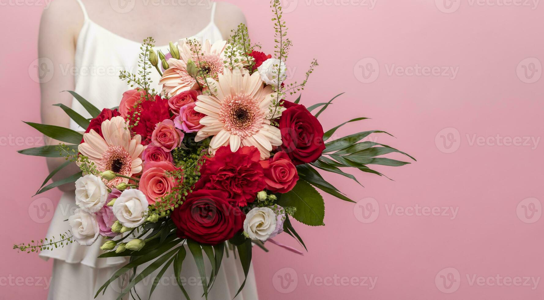 Mockup Bride, Cropped Woman In White Wedding Dress Holds Mixed Fresh Flowers, Bouquet On Pink Background. Copy Space For Text photo