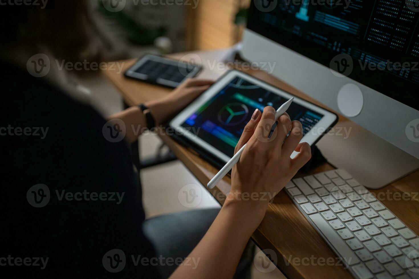 Futuristic women Engineer working with Holographic Augmented Reality and 3D Wind Turbine Model on tablet at home office ,Concept of technology and environment photo