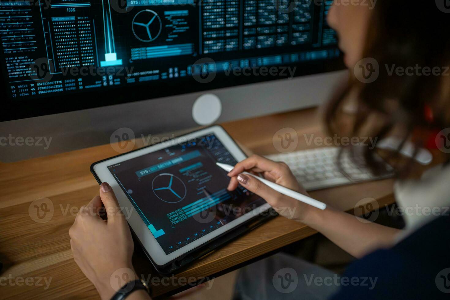 Futuristic women Engineer working with Holographic Augmented Reality and 3D Wind Turbine Model on tablet at home office ,Concept of technology and environment photo
