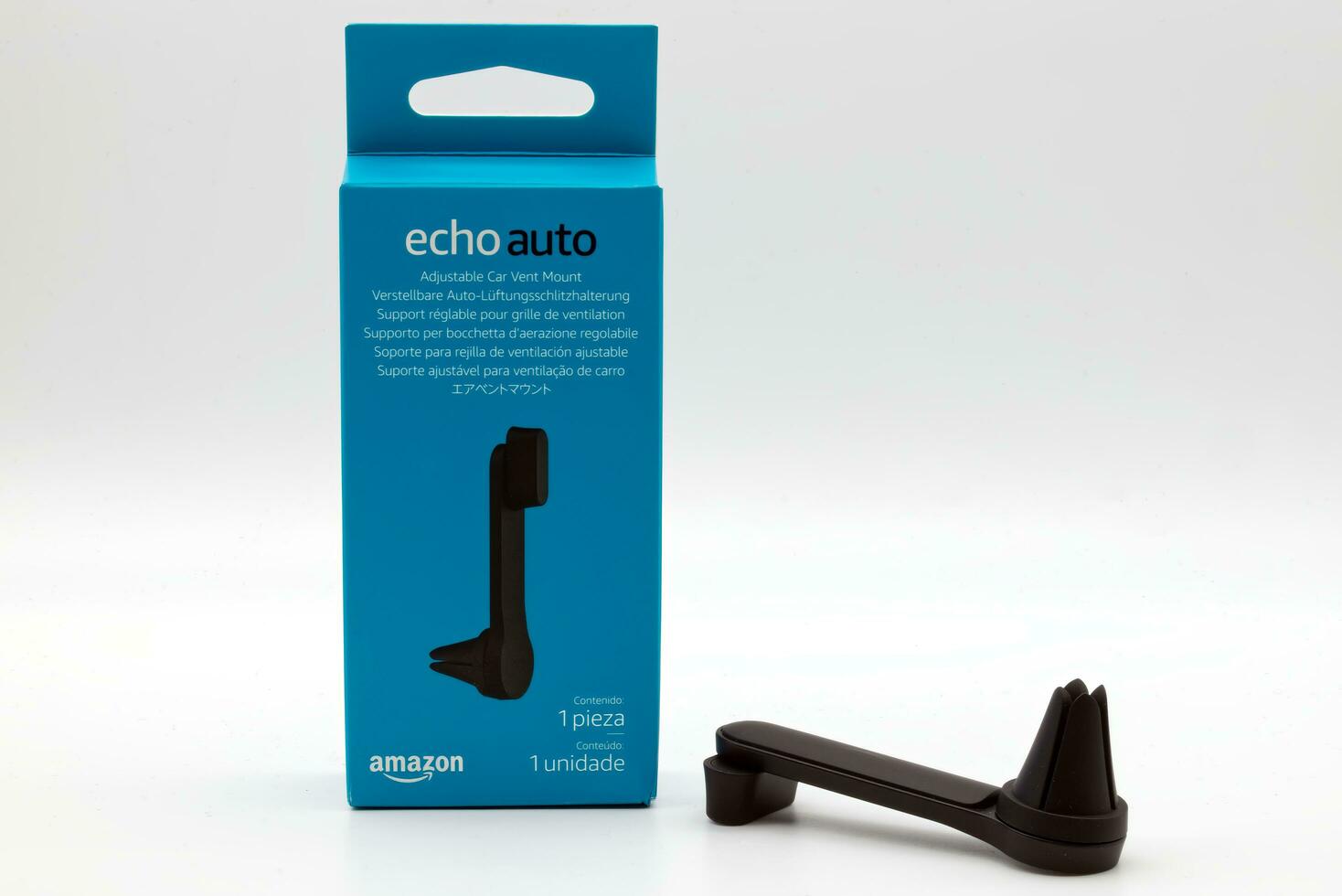 Bologna  Italy  July 16, 2023  Amazon Echo Auto. Adjustable car vent mount. Alexa, virtual assistant AI. photo