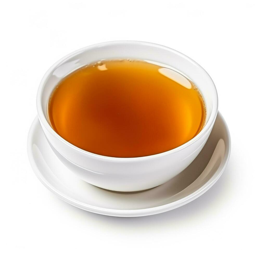 Caramel honey tea in a white cup isolated on white background photo