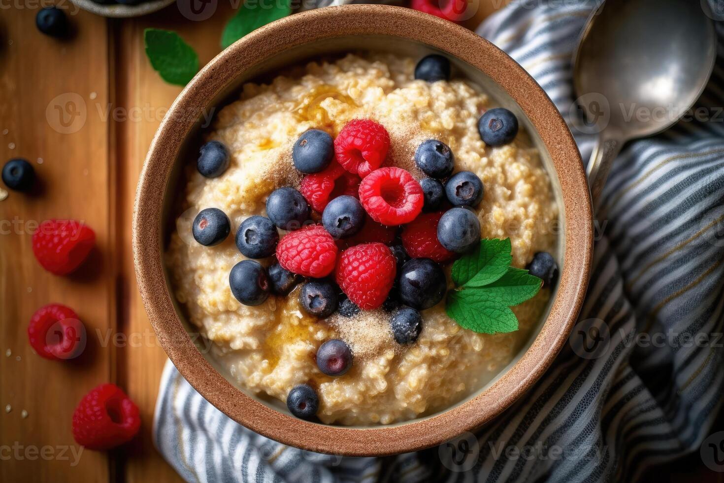 stock photo of oatmeal breakfast with topping on the kitchen