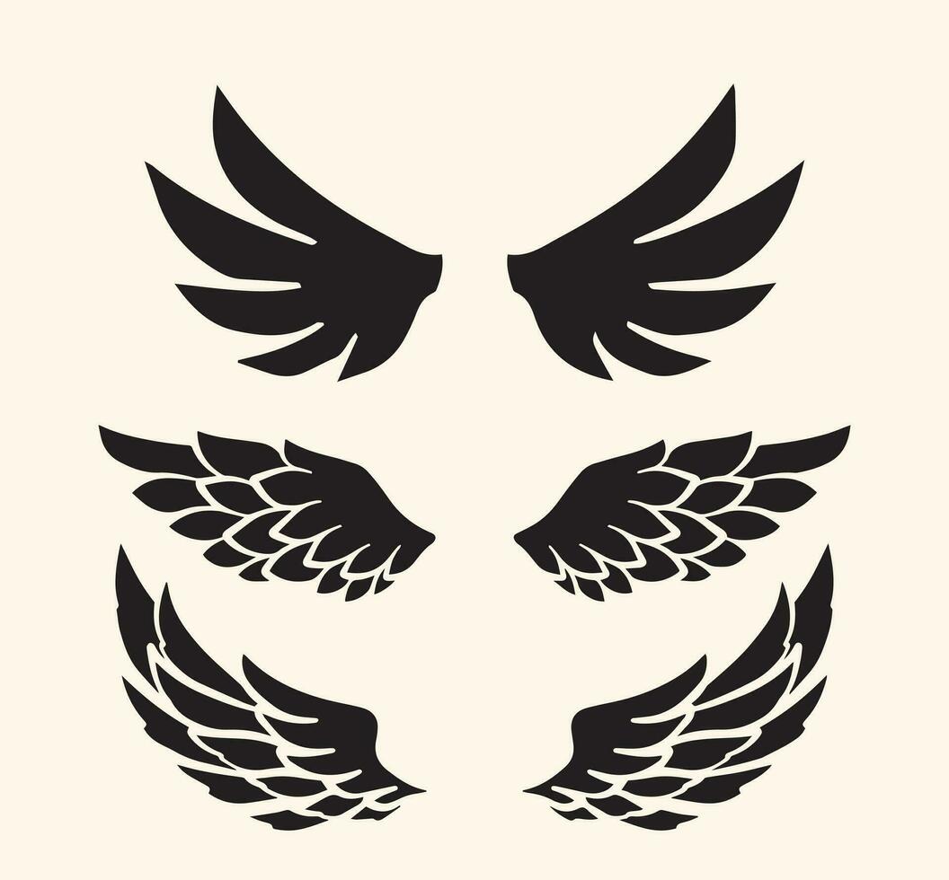 Set of hand drawn angel or bird wings silhouettes vector