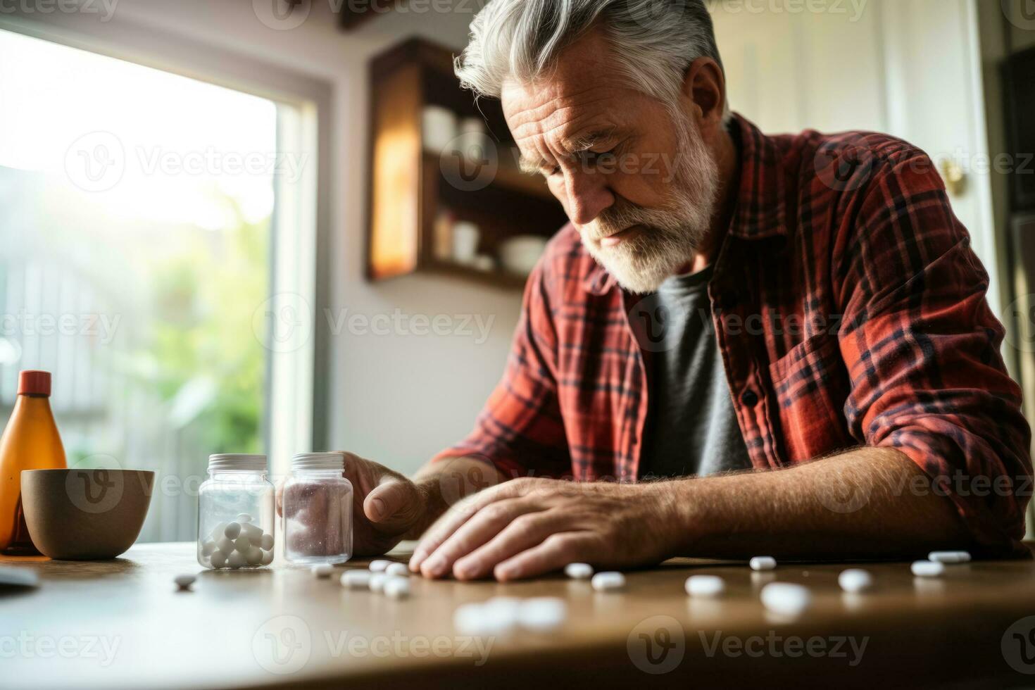 American man in red shirt pouring pills from prescription pill bottle photo