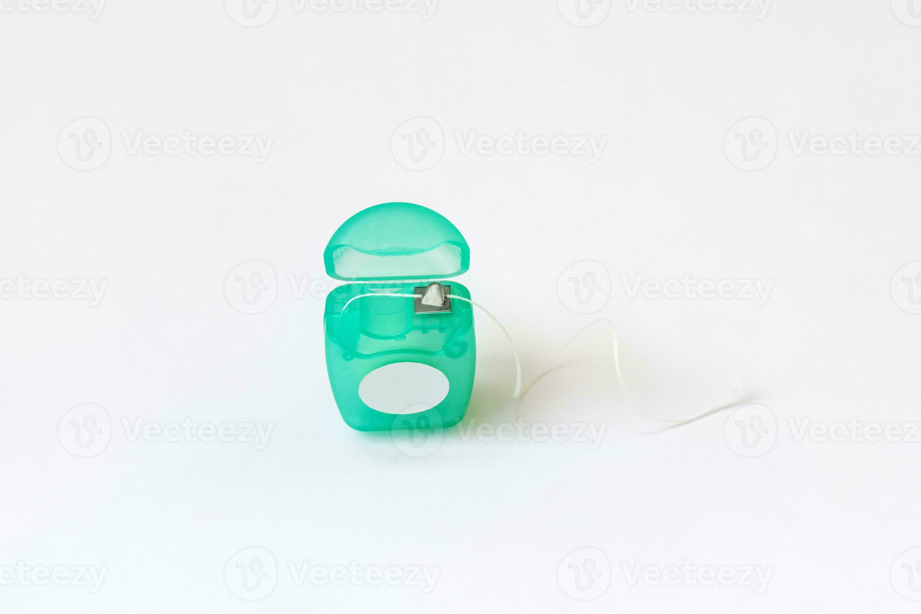 Dental floss container on white background. 26569791 Stock Photo at Vecteezy