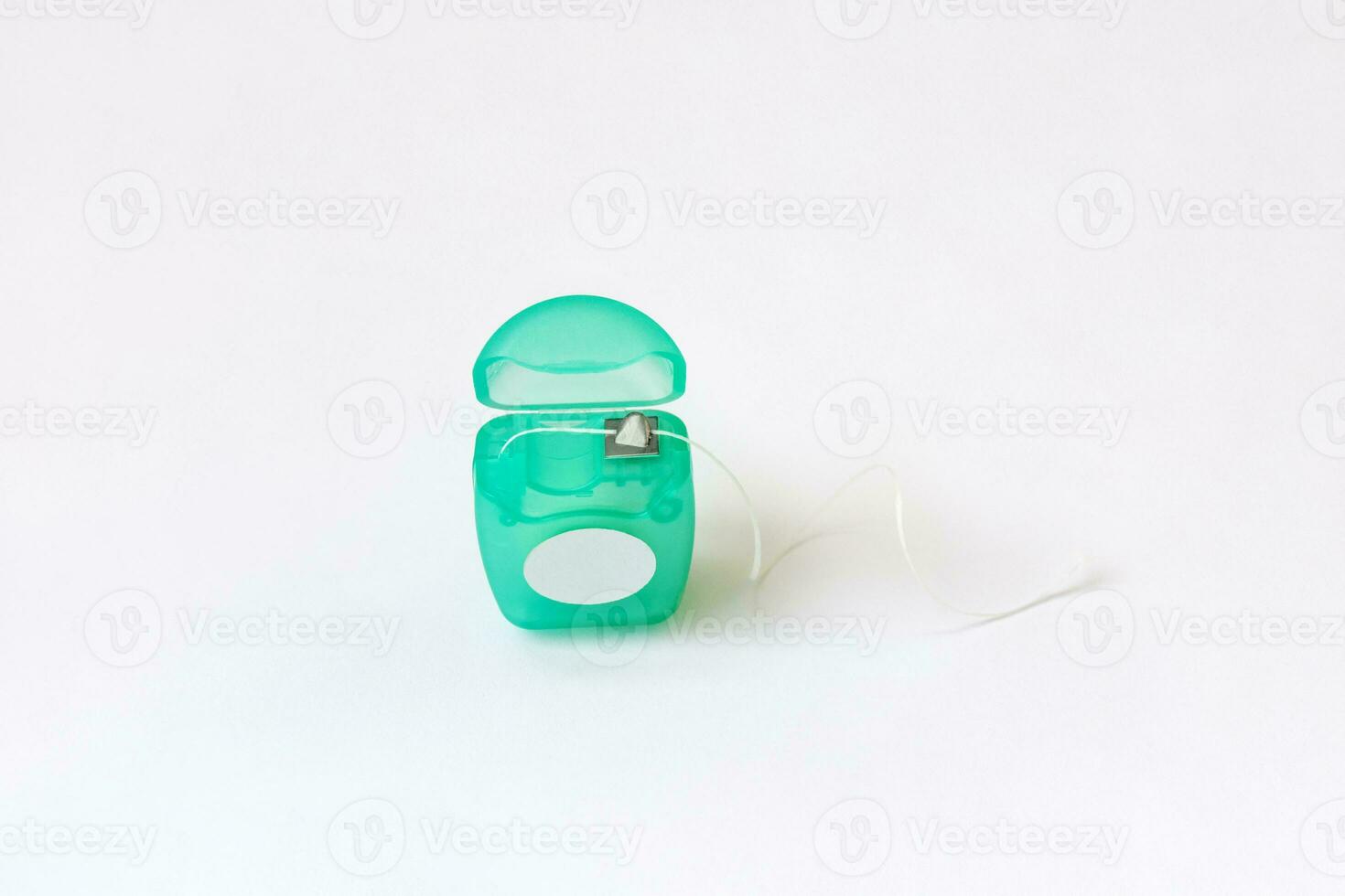 Dental floss container on white background. 26569791 Stock Photo at