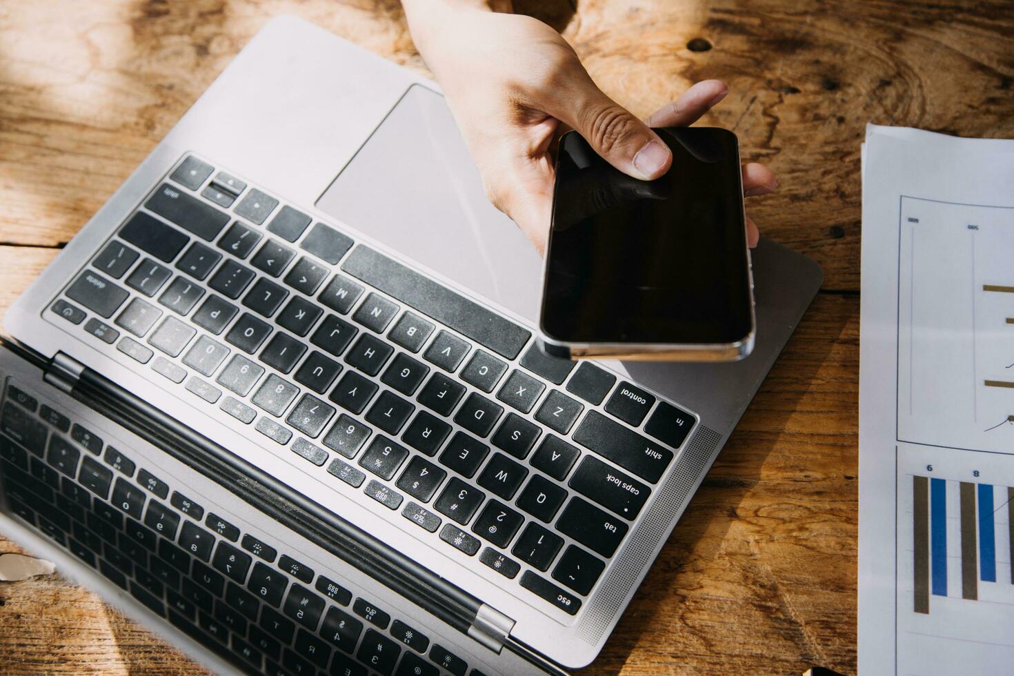 Entrepreneur Asian businessman and businesswoman discussing new business project in tablet in modern Meeting In Modern Office, Asian business casual concept. photo