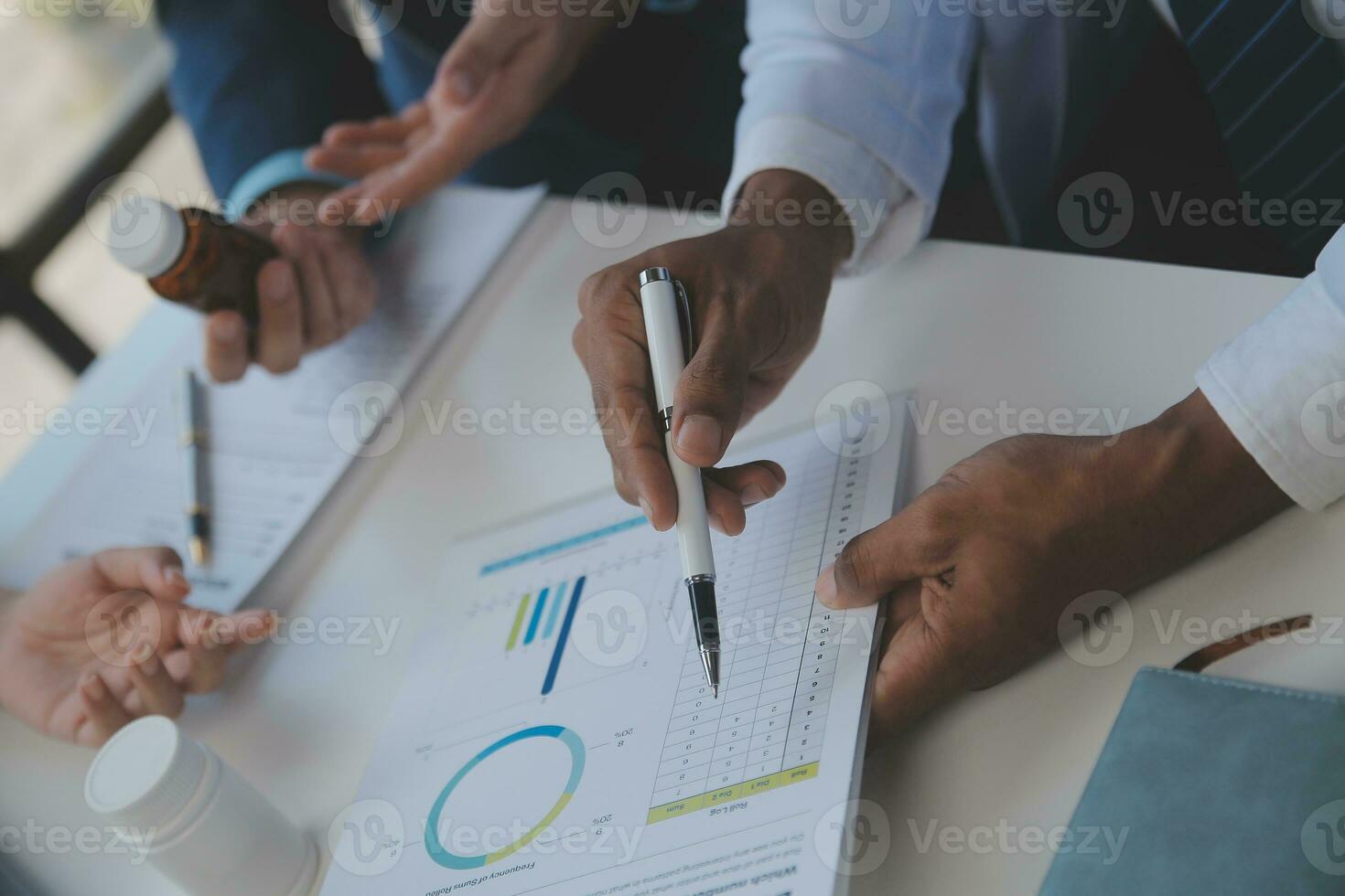 Cropped image of successful medical doctors discussing diagnosis during the conference photo
