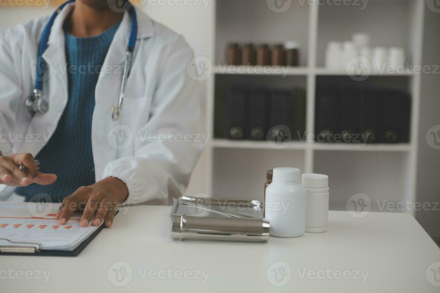 Professional lab. Amazing longhaired medical worker wearing uniform while using microscope during research photo